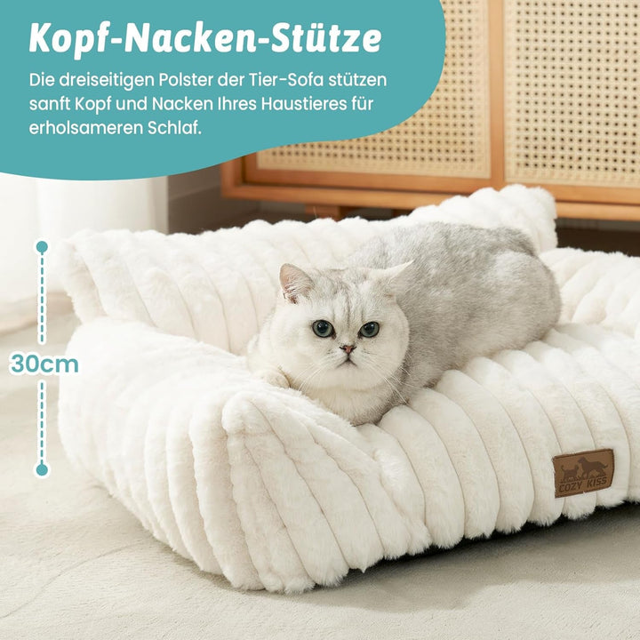 Canapea COZY KISS pentru pisici mici și mari, pat confortabil pentru pisici cu margini de susținere și bază antiderapantă, lavabil, blană artificială moale, ideal pentru sufragerie sau dormitor (crem, 65 x 44 x 30)